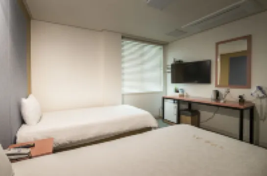 Champion Hotel Hotels near Yongduam Rock