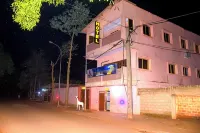Abomey Event Hoteles cerca de Place GOHO