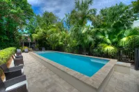 Waterfront Pink House with Private Dock & Pool - Beach