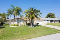 Waterfront home with a POOL in Cape Coral! 12 miles to Fort Myers Beach!