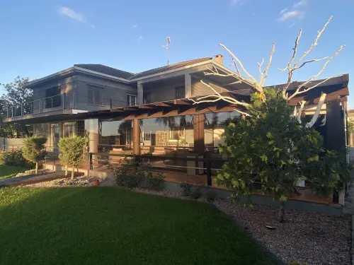 Luxury villa with detail decorated pool