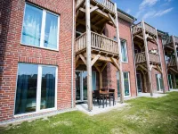 Modern, bright apartment with terrace, directly behind the dike, in the North Sea resort Wremen Hotels in Wremen