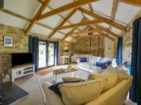Spacious barn conversion in quiet 2 acre gardens, Cornwall Coast  Lily Cottage