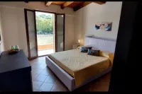 Maya House. Hotels in Valledoria