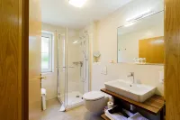 Bright, quiet and modern apartments with a large garden right in the center