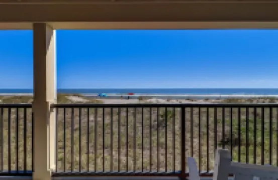 Beach Style Condo Includes Google Mini Home and Beach Access 2 Bedroom Condo by RedAwning