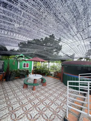 竹橙小屋和開間 鄰近SM City Urdaneta Central的酒店