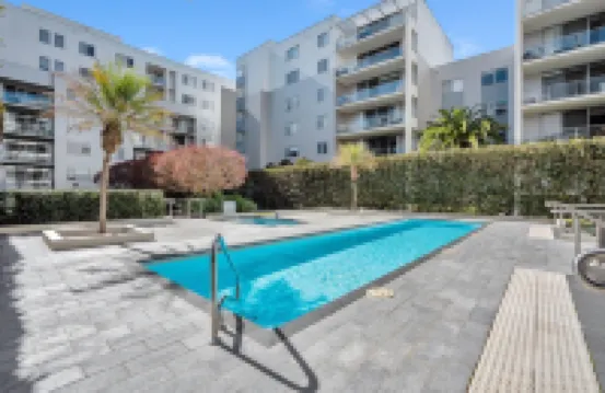 Modern 1-Bed Unit with Pool Views and Balcony
