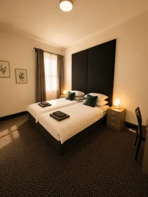 Inviting a Double Room for Business or Leisure - Holiday Apartments