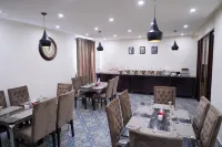 Hotel Elegant Executive Suites - breakfast