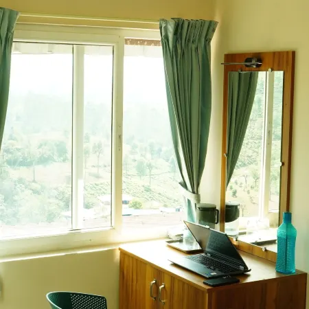 Vasu Inn - Rooms in Valparai