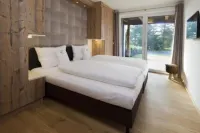 Ski & Golf Suites Zell am See by Alpin Rentals - Incl Summercard فنادق في Bruck an der GroBglocknerstraBe