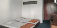 Hotel Lembah Nyiur Cikopo Mitra RedDoorz - Habitación Triple