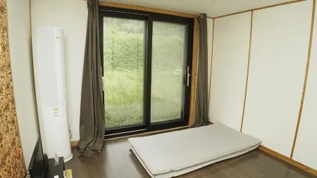 Andong Mungpyeonhan Saesang Pension Отели рядом с достопримечательностью «Dosanseowon Confucian School»