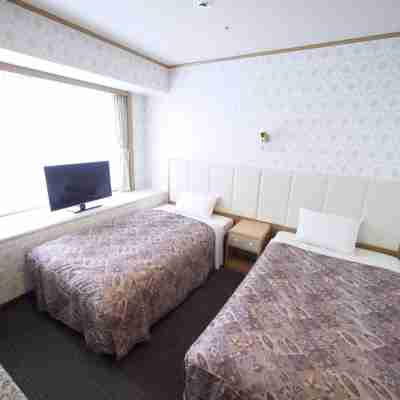 ユーコミュニティホテル Rooms