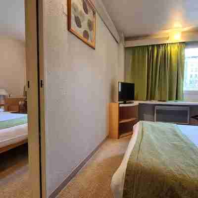 Sweet Home Hôtel Rooms
