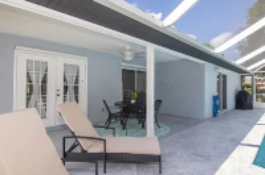 Beach Getaway with Private Heated Pool and Two King Beds