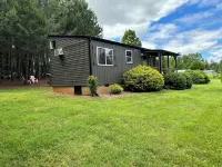 Adventurous tiny house! Located on 1 acre surrounded by evergreen forest