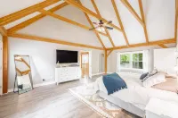 Beautiful and Private 6000 sqft waterfront home with private dock and hot tub!