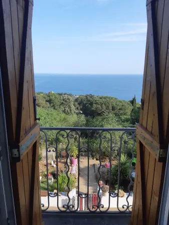 Top of villa, terraces, swimming pool at Mont St Clair, pétanque court with sea view