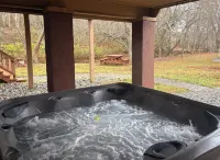Riverfront Log Cabin with Hot Tub-Tubing on the River, Pet Friendly.