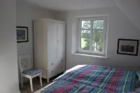 Cottage on park-like grounds with pond Hotel a Nordstrand