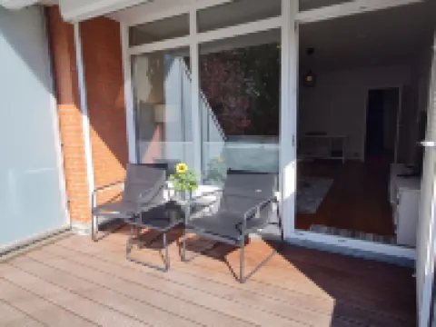 Modern city apartment with balcony and private parking space in a quiet location