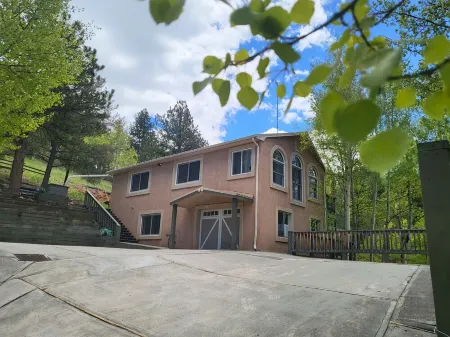 Beautiful Rocky Mountain Home with Views Near Cripple Creek on 1 Acre.