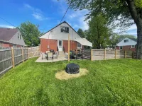 Charming 3-bedroom house with fenced yard in a quiet  neighborhood  Dog Friendly Hotels near American Freight - Appliance, Furniture, Mattress