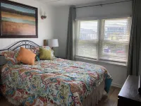 Just steps to the beach, bar, and playground park!