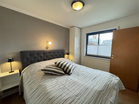 Near the beach, modern ground floor apartment with balcony, free Wi-Fi