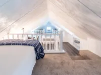Vintage charm meets modern comfort in this historic 1850s cabin at Lake Hartwell Hotels in Gumlog