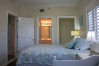 Luxurious 2nd floor beachfront condo w wrap-around balcony @ The Enclave - Private Pools