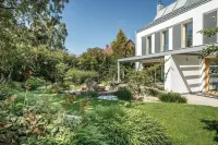 Wohnen im Architektenhaus - Haus S 1 Hoteles en Puchheim