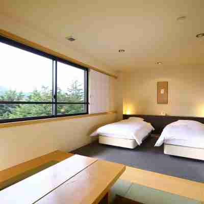 万座温泉 日進舘 Rooms