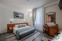 HOTIDAY Room Collection - Le Grazie Hotel a Le Grazie