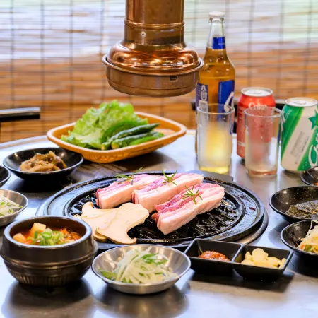 Jeju M Resort Отели рядом с достопримечательностью «Храм Попхваса»