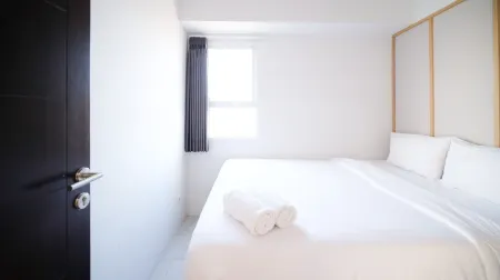 Homey and Comfy 2Br Apartment at Suncity Residence Отели в г. Sidoarjo