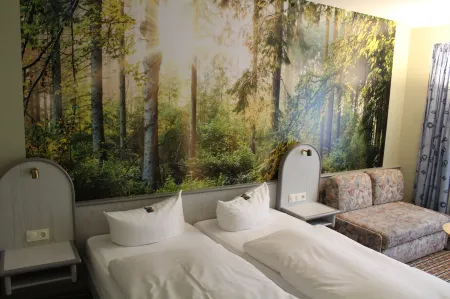 Hotel Rennsteig Отели в г. Нойштадт-ам-Ренштайг