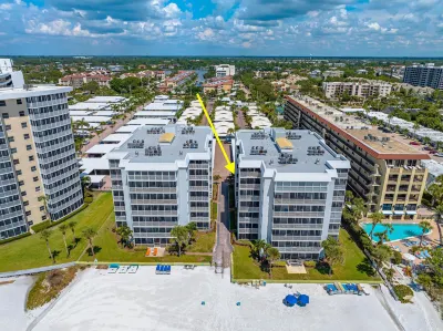 Crescent Arms by Beachside Management