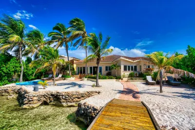 Private Beach Ocean Front Boat Dock Tiki Bar Hotels near Pos Chiquito Beach Park