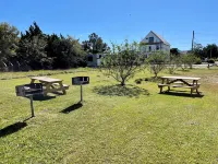 Private Deck and Spacious Living Area - Charming Coastal Retreat