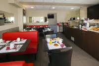 Séjours & Affaires Reims Clairmarais - Bữa sáng