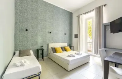 Merulana 139 Suites Отели в г. 
