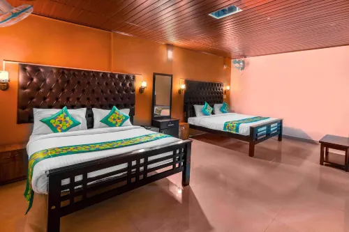 Treebo River View Resort Отели в г. Канданаколли