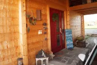 Fantastic apartment in a log cabin in front of the mountains