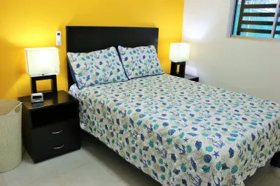 Beautiful condo in a secured community! Close to Cancun! 5 min drive to beach!