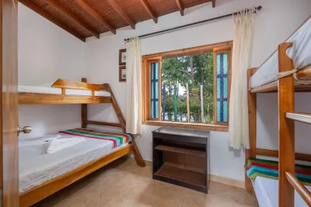 Chiriqui farm in Guatape in front of the Peñol stone