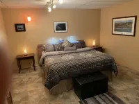 Mountain view, beautiful walk out suite overlooking a park and creek. 3bedrooms.