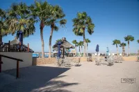 Oceanfront ground level condo on a Private Beach in a lovely resort!